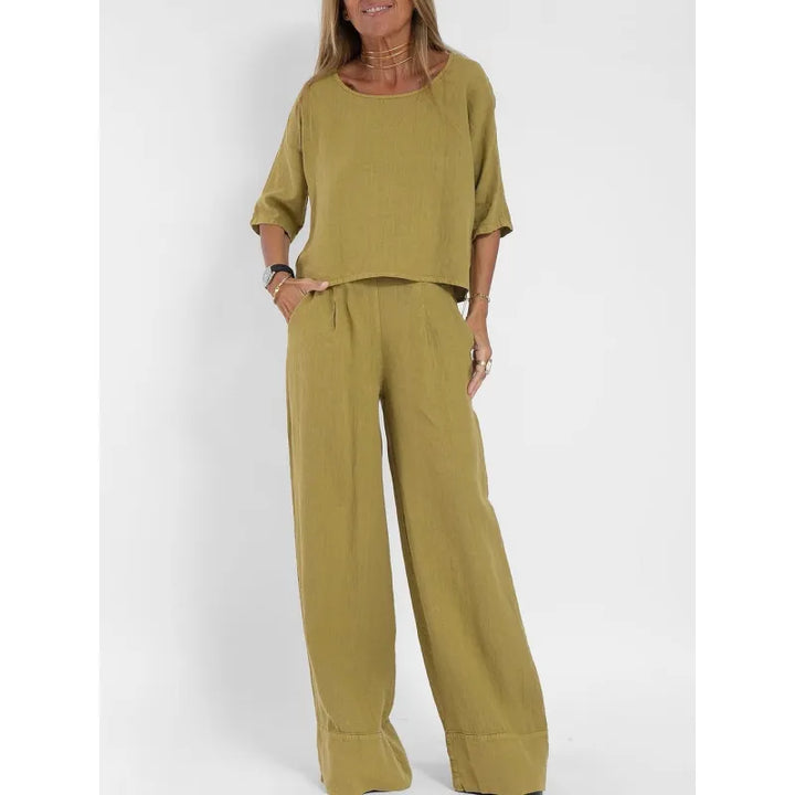 Women's two piece boatneck top and wide leg pants set, perfect for casual wear.