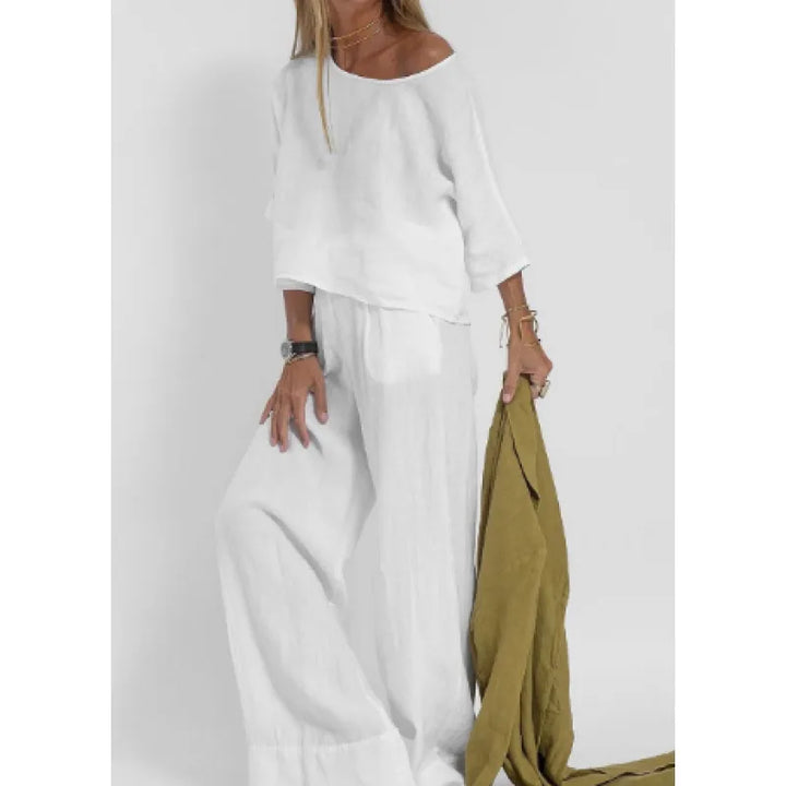 Versatile women's two-piece set featuring a boatneck top & comfy wide leg pants.