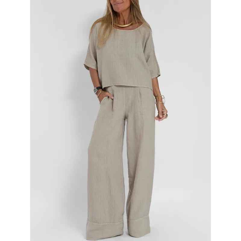 Women's flowy wide leg pants set with a flattering boatneck top, great for relaxed style.