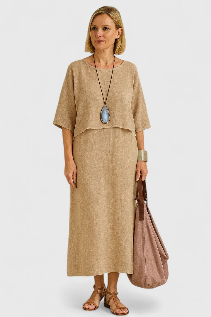 Flowing women's maxi dress & short sleeve top two-piece set, offering a relaxed yet elegant summer look.