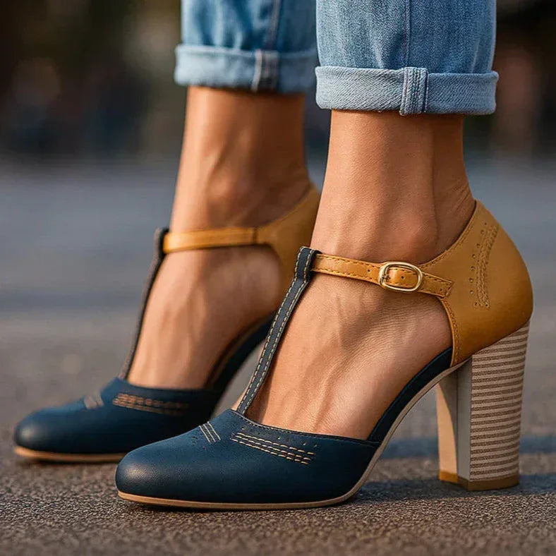 Stylish two-tone block heel pumps for women. Versatile classic heels suitable for workwear, dress, or daily outfits.