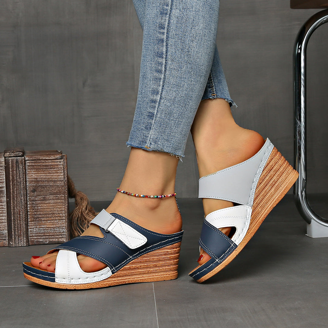 Slip-on two-tone wedge sandals, perfect women's summer footwear for casual and beach days.