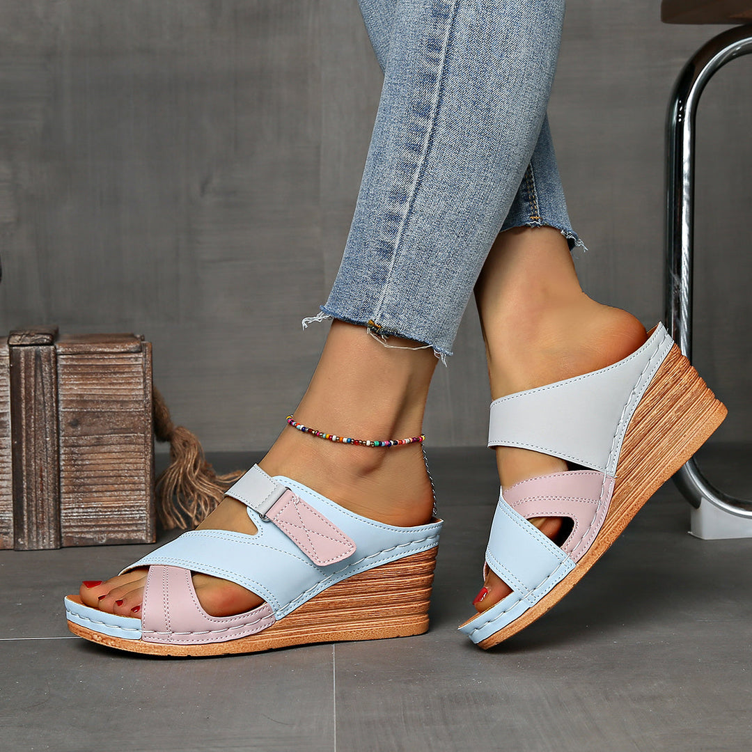 Women's two-tone wedge beach slides, great for poolside, casual outings, and summer fashion.