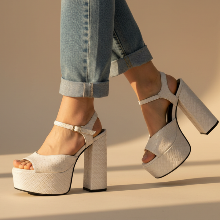 Women's ultra high block heel platform sandals with buckle strap. Perfect for parties & evening wear.