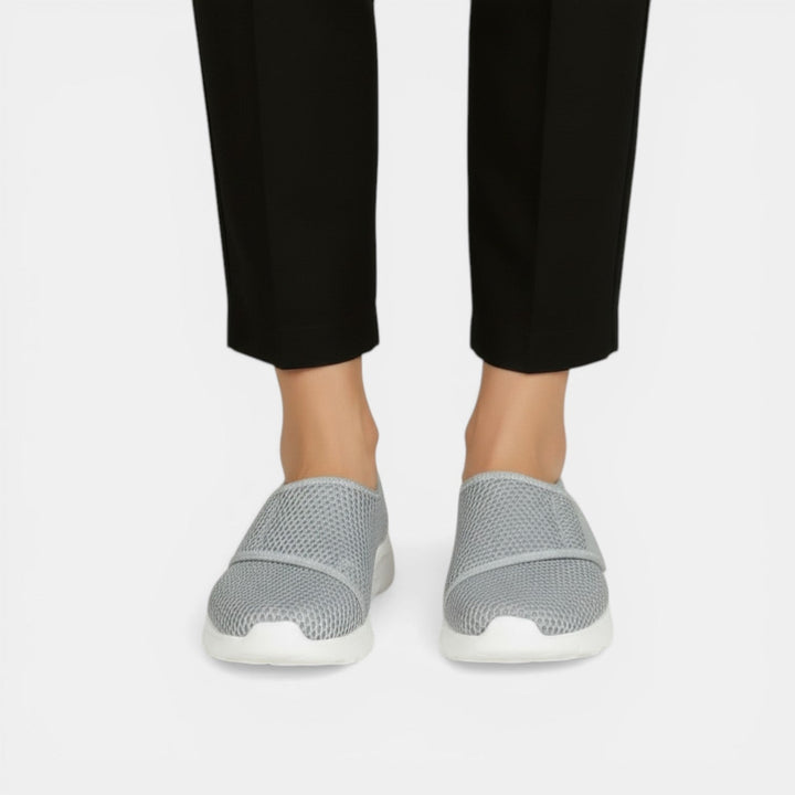Slip-on women's lightweight comfort sneakers, perfect for walking & everyday wear with arch support.