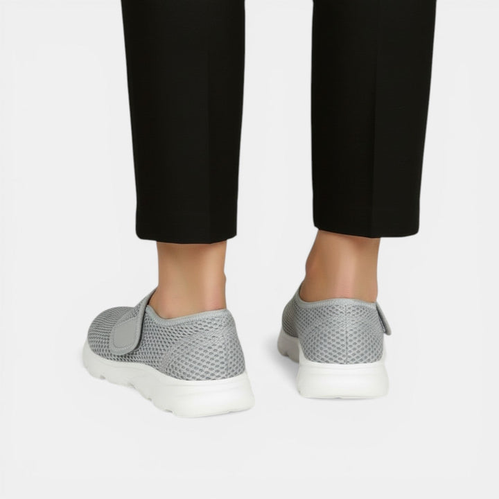 Breathable orthopedic walking sneakers for women, offering lightweight comfort & essential arch support.