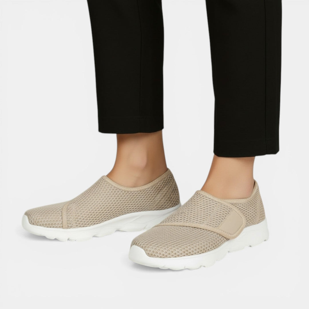 Active women's lightweight sneakers with orthopedic arch support, ideal for walking & daily comfort.