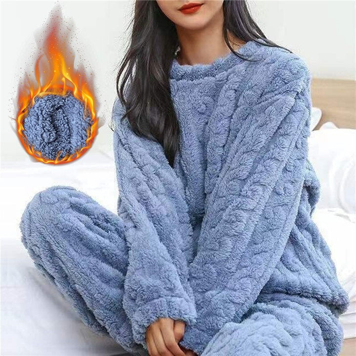 Warm women's pajama set, two-piece ultra-soft nightwear for comfortable winter relaxation and home comfort.