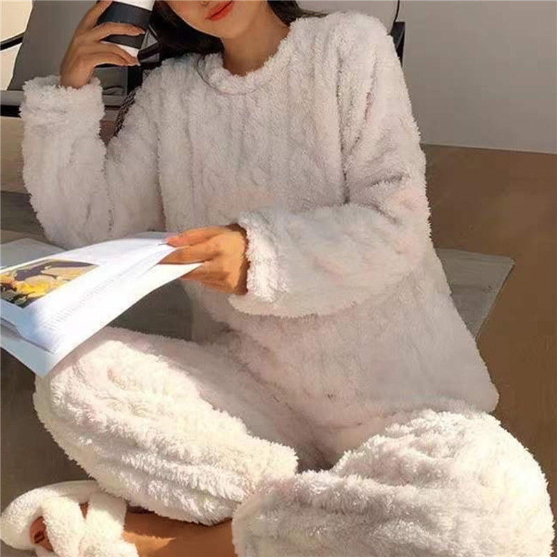 Luxurious ultra-soft women's pajama set. Cozy two-piece loungewear for warm sleepwear & home comfort.