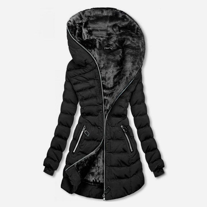 Model wearing a stylish long women's ultra-warm winter coat, ideal for cold weather fashion.