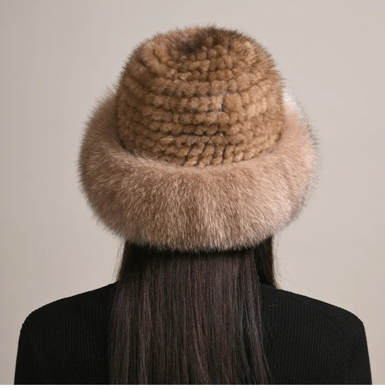 Cozy women's winter hat in a stylish knit. Ultra-warm headwear, a chic fall accessory for elegant cold weather.