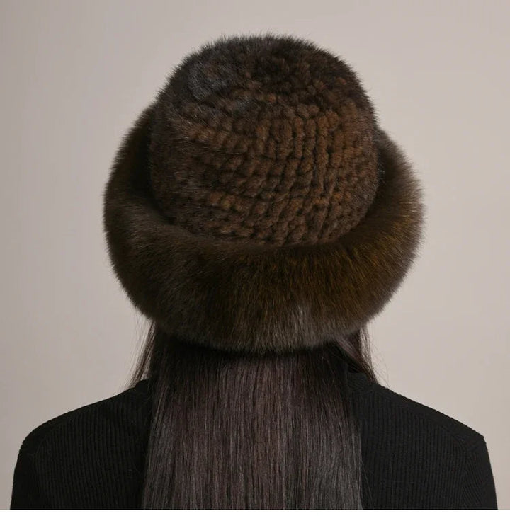 Ultra-warm women's winter hat. Chic, elegant headwear for cold weather. A stylish beanie for fall fashion.