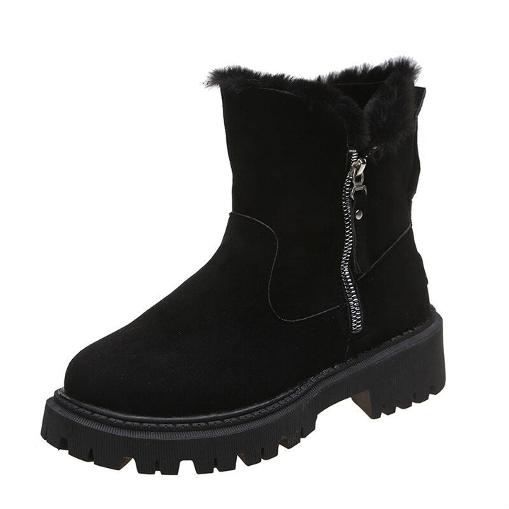 Fashionable women's winter boots, providing ultra warmth and style for cold weather adventures.