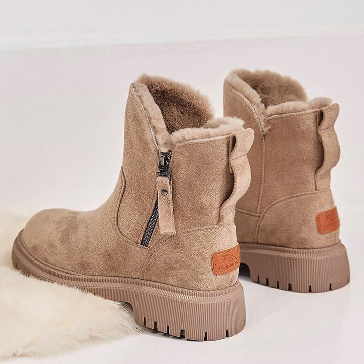 Plush-lined women's ultra warm snow boots, offering ultimate protection and comfort against winter cold.