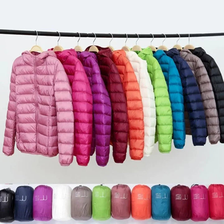 Packable women's ultralight jacket, providing insulated warmth for everyday wear & cold winter days.