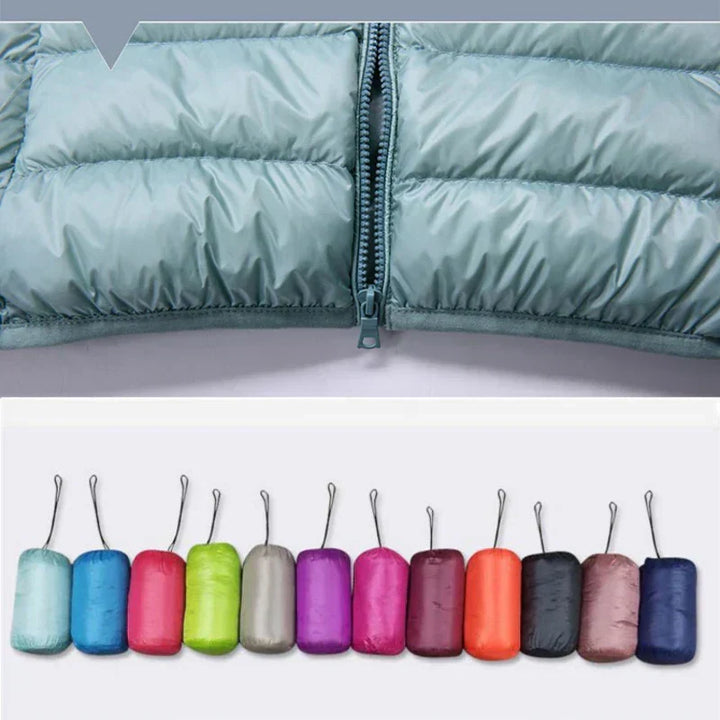Versatile women's insulated jacket, a hooded ultralight design for winter warmth and easy travel.