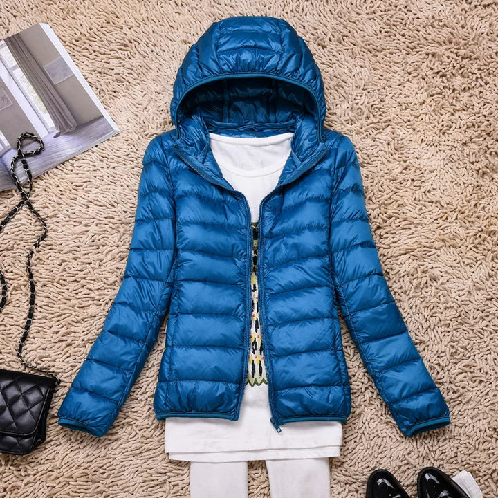 Everyday women's insulated hooded jacket, ultralight and cozy for fall & winter warmth and style.