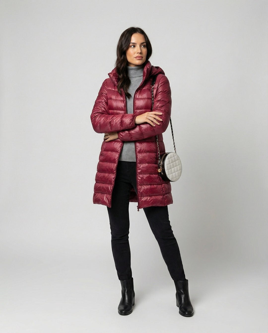 Women's ultralight insulated hooded jacket, perfect for all seasons.
