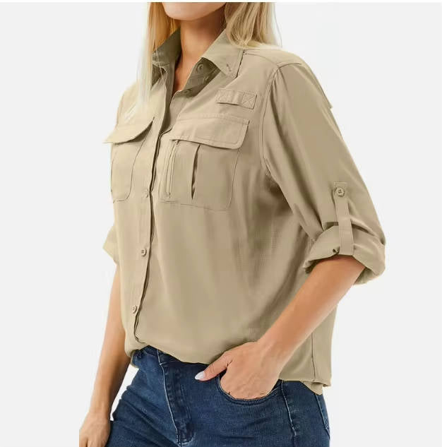 Woman wearing a long sleeve UV protection safari shirt, enjoying outdoor hiking & sun safety.