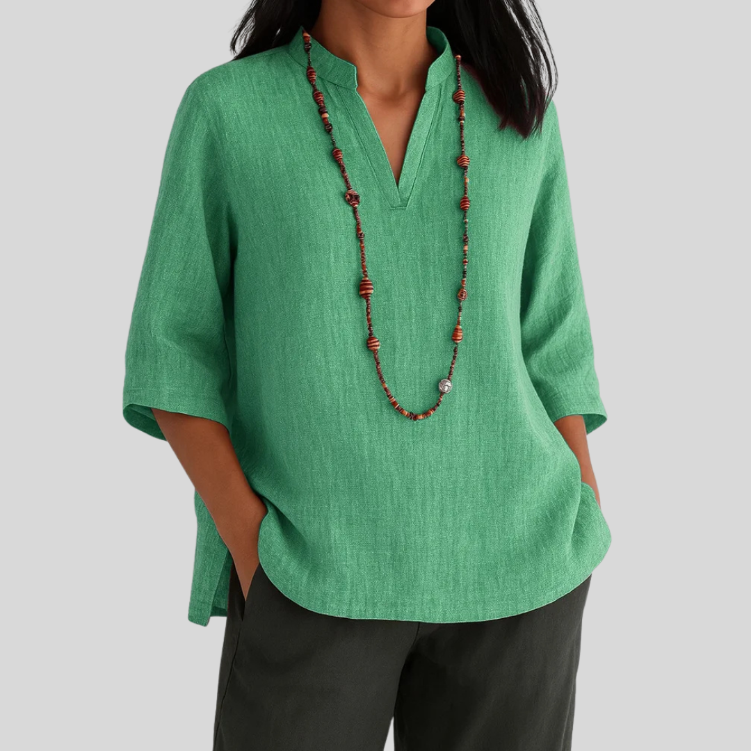 Women's V-neck 3/4 sleeve casual blouse in a solid color, perfect for relaxed everyday wear or smart casual outfits.