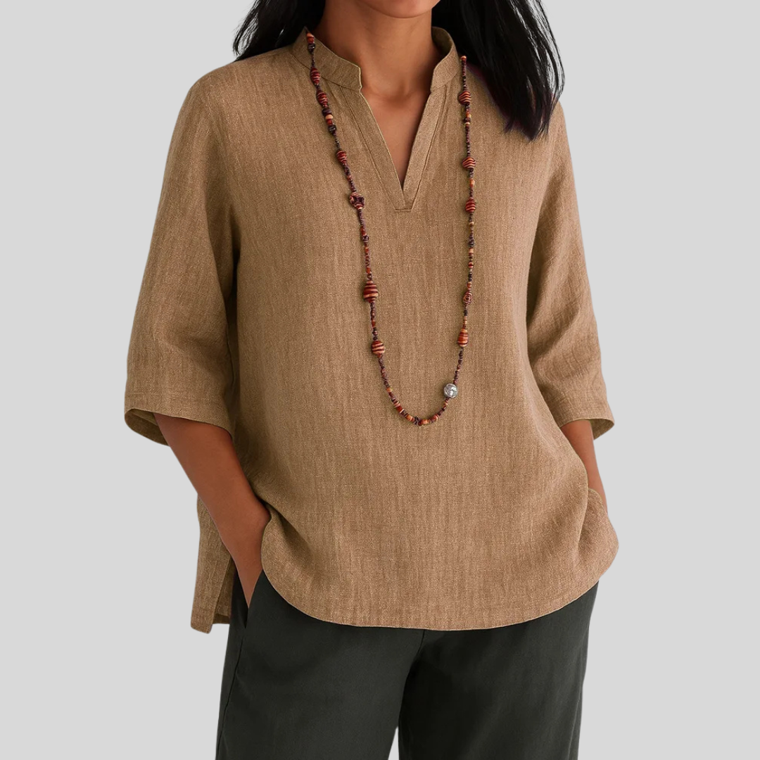 Stylish women's V-neck 3/4 sleeve top, a comfortable and effortless casual blouse for everyday wear and versatile fashion.