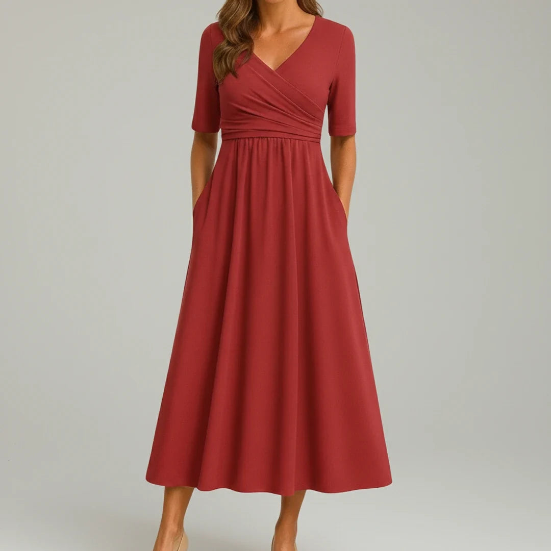 Casual women's V-neck midi dress, an A-line design offering flowy comfort and functional pockets.
