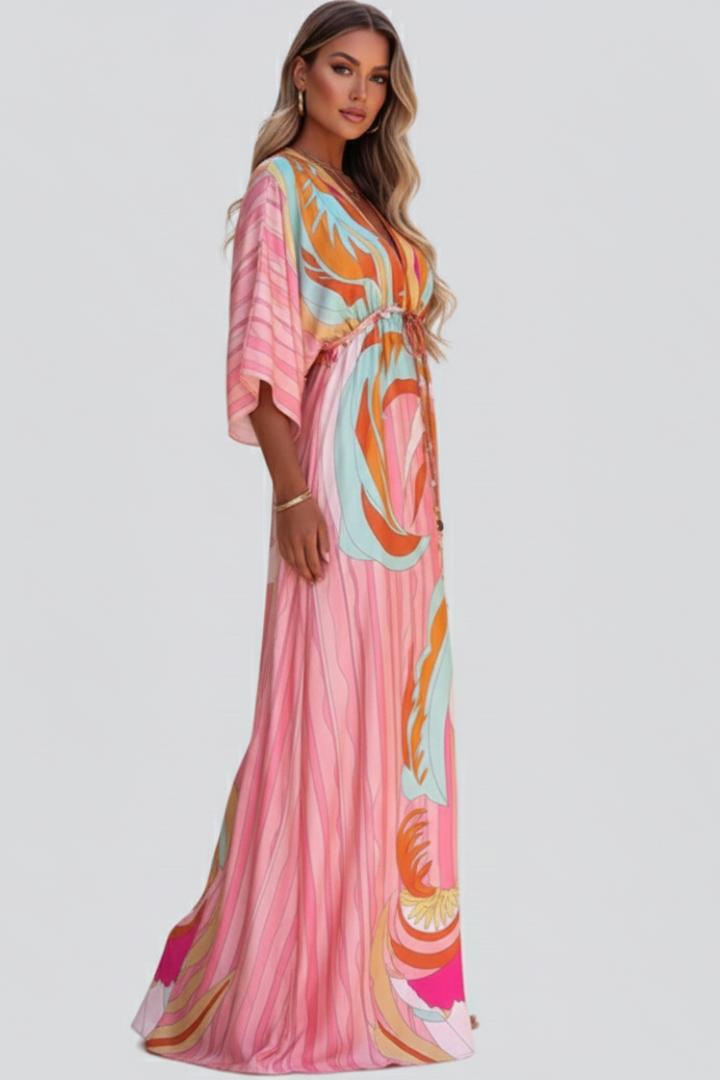 Stylish women's V-neck long dress with a vibrant abstract print and a chic belt. Ideal for summer fashion.