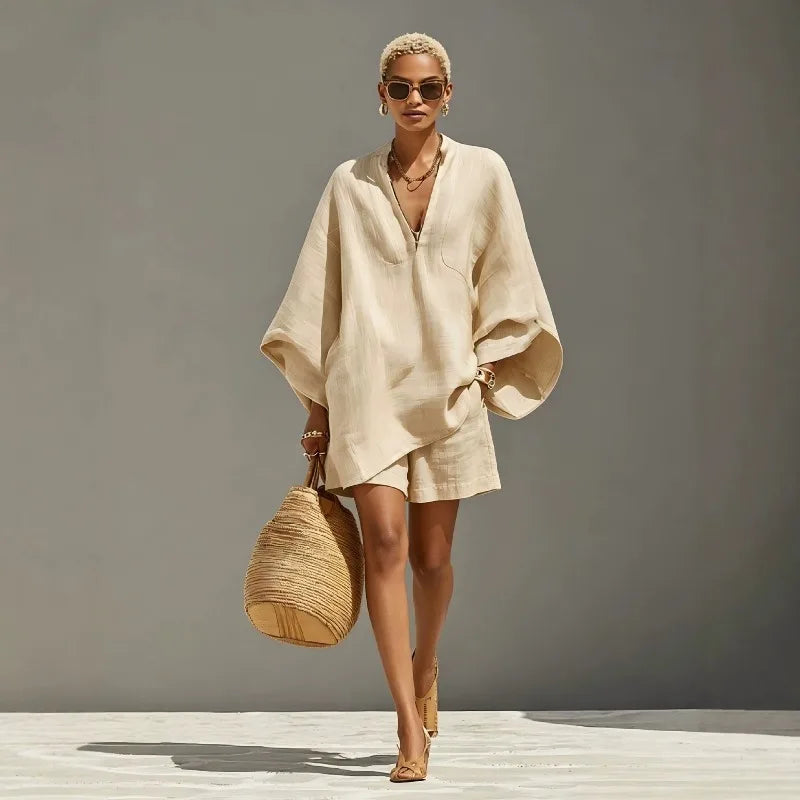 Women's V-neck batwing sleeve matching shorts set, perfect for casual summer wear or vacation. Relaxed fit lounge outfit.