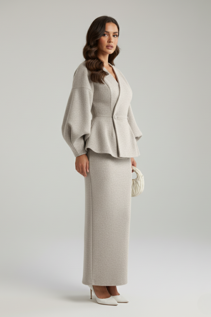 Professional women's V-neck blazer and matching skirt suit, complete with elegant puff sleeves.