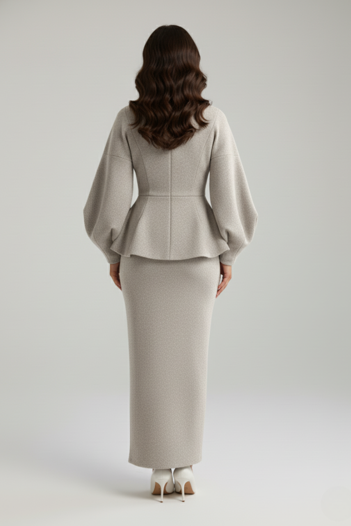 Stylish women's V-neck blazer skirt suit. Features puff sleeves, tailored fit, suitable for office attire.