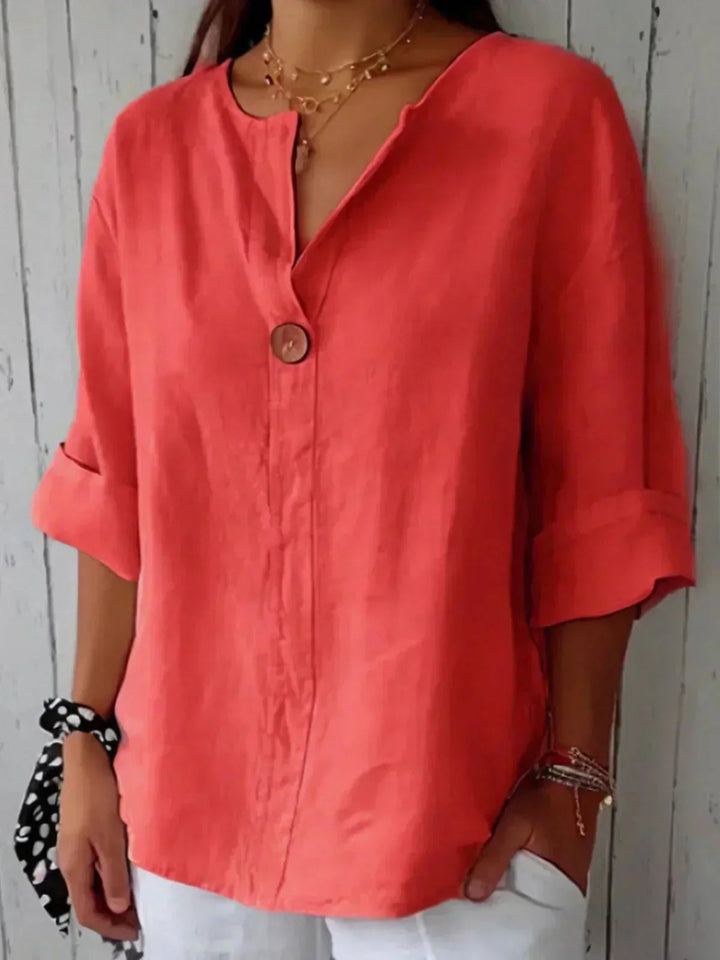 Elegant women's V-neck long sleeve blouse, featuring a relaxed fit & button-down design for all seasons.