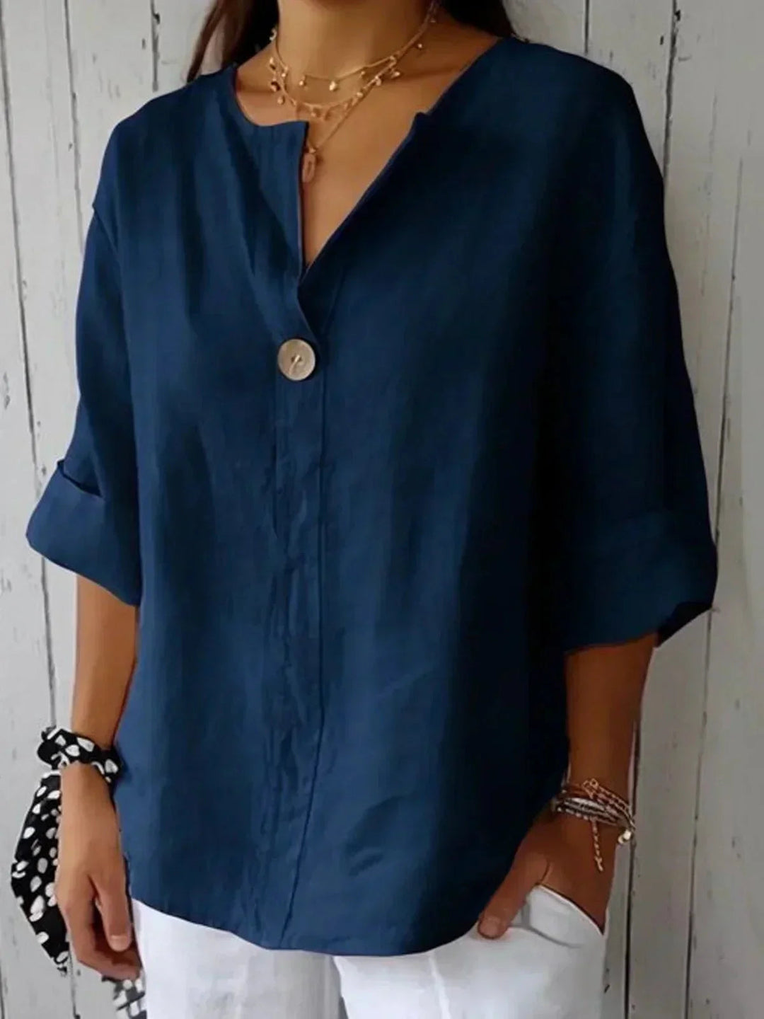 Spring/Fall women's V-neck blouse with versatile roll-tab long sleeves, ideal for casual & office outfits.