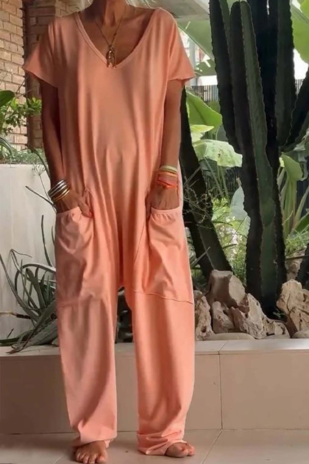Summer-ready women's V-neck casual jumpsuit, a comfortable one-piece for relaxed everyday style.