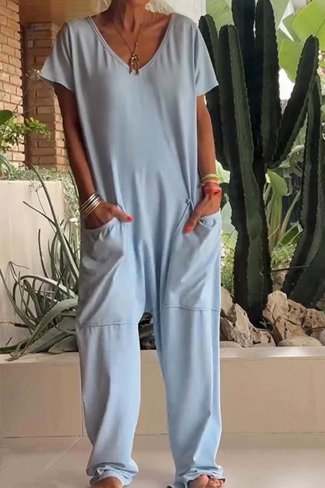 Versatile women's V-neck jumpsuit, ideal for casual wear, lounging, or a chic summer travel outfit.