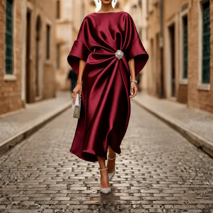 Comfortable women's v-neck midi dress with elbow sleeves, a flattering flared skirt, and pockets.