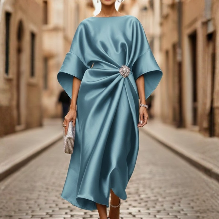 Versatile women's midi dress, v-neck, elbow sleeve, and flared skirt. Ideal for spring/summer occasions.
