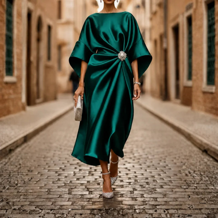 Comfortable V-neck elbow sleeve midi dress for women, with a stylish flared skirt & practical pockets.