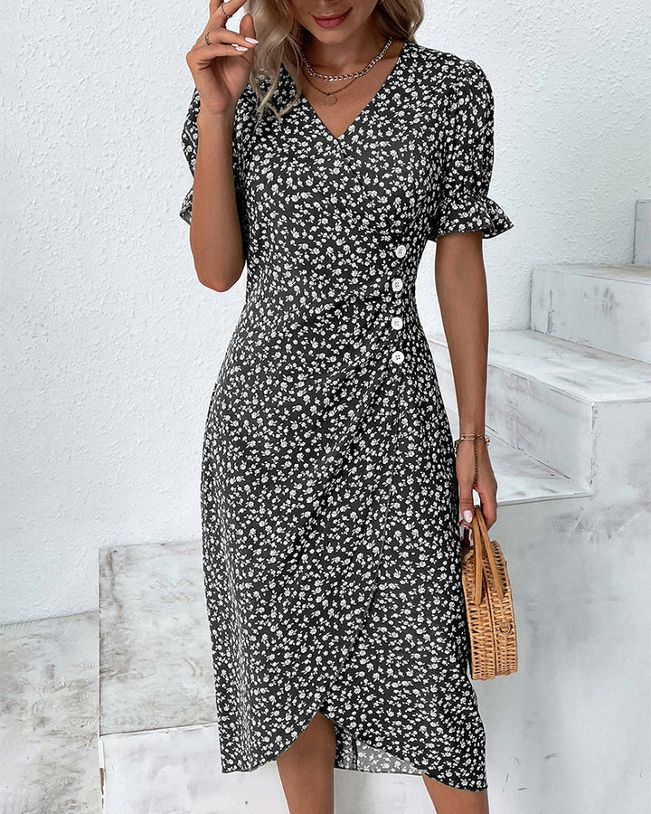 Woman wearing a relaxed fit V-neck floral flowy dress, ideal for effortless summer comfort.