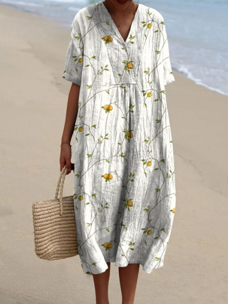 Women's V-neck floral midi dress highlighting discreet side pockets, adding convenience.