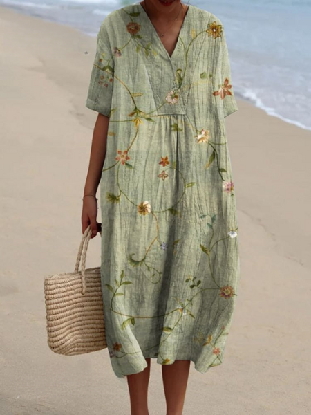 Bohemian style V-neck floral midi dress for women, offering a relaxed and chic summer look.