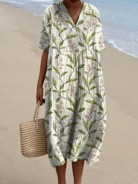 Versatile women's short sleeve floral midi dress with V-neck, suitable for casual & vacation wear.