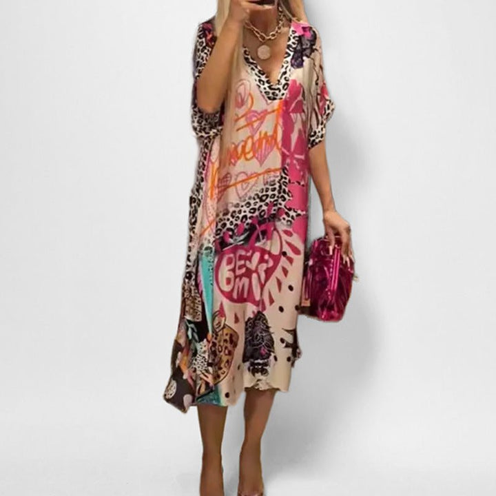 Comfortable women's graphic print swing tunic dress. Casual V-neck short sleeve dress, ideal for summer & vacation.