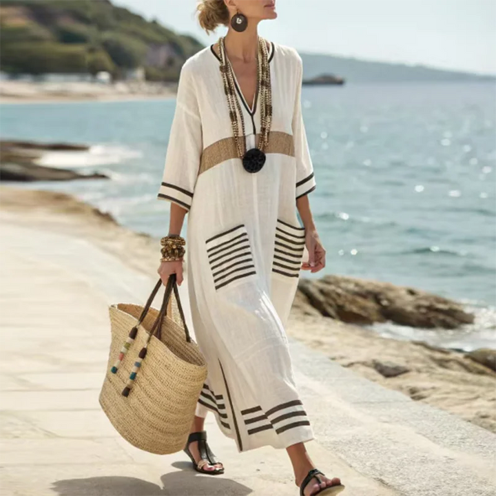 Effortless women's V-neck kimono maxi dress for beach vacations. Chic summer fashion with a comfortable, relaxed fit.