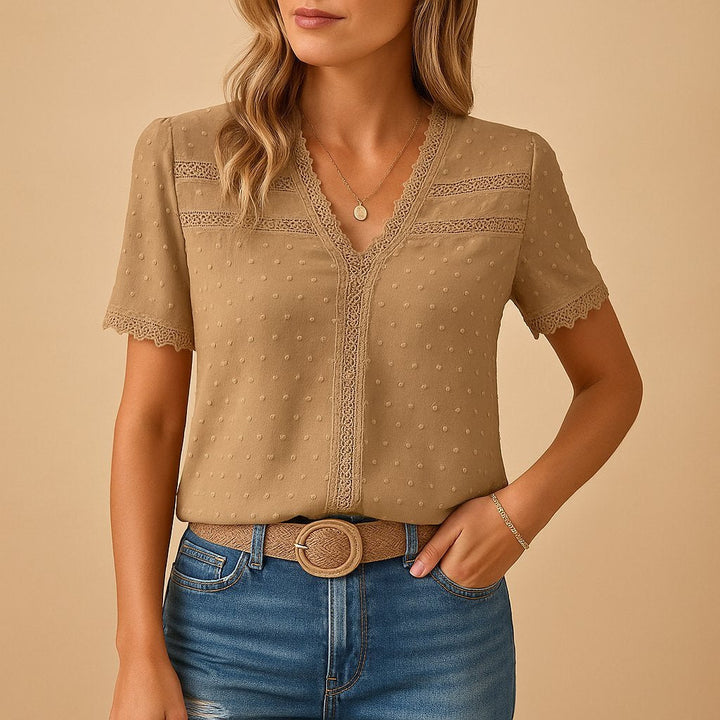 Women's V-neck lace trim textured dot blouse, short sleeve, relaxed fit for effortless style.
