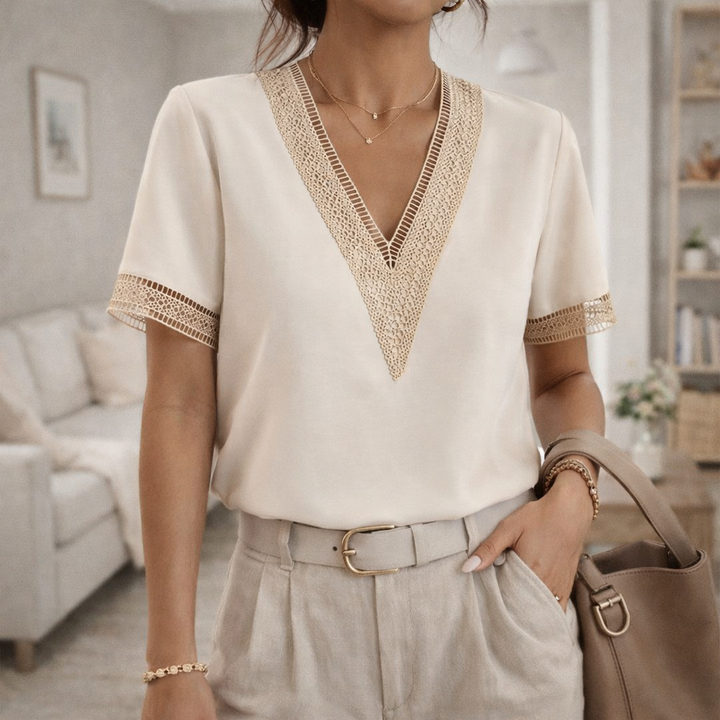 Women's V-neck lace trim top, relaxed fit, short sleeve, perfect for effortless casual style.