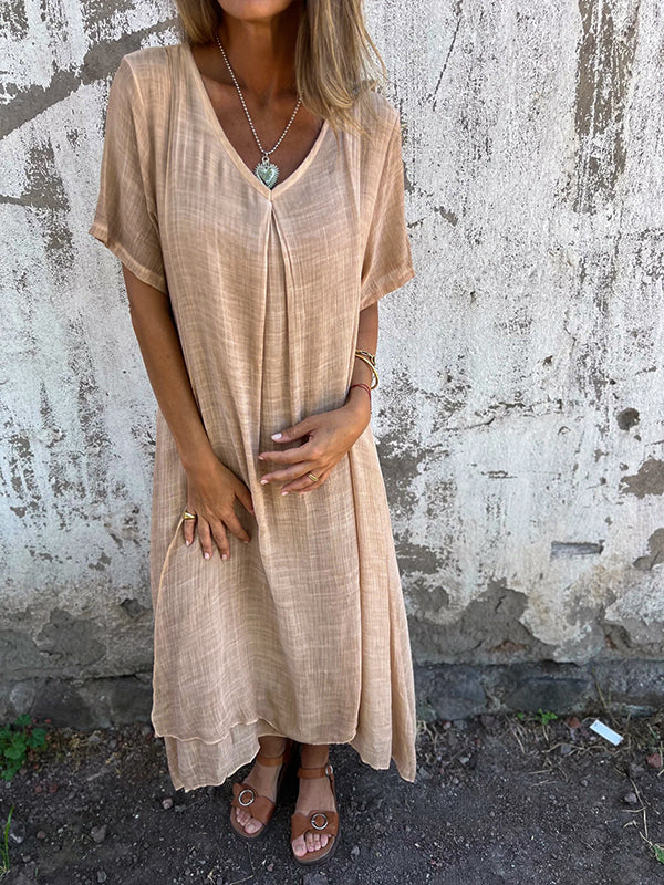 Women's V-neck loose fit midi dress, comfortable & flowy for versatile everyday style and summer casual wear.