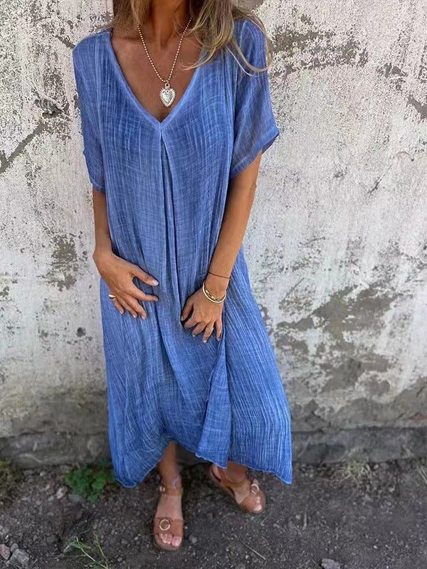 Elegant women's V-neck midi dress with a relaxed, loose fit. Perfect for versatile summer outfits & everyday comfort.
