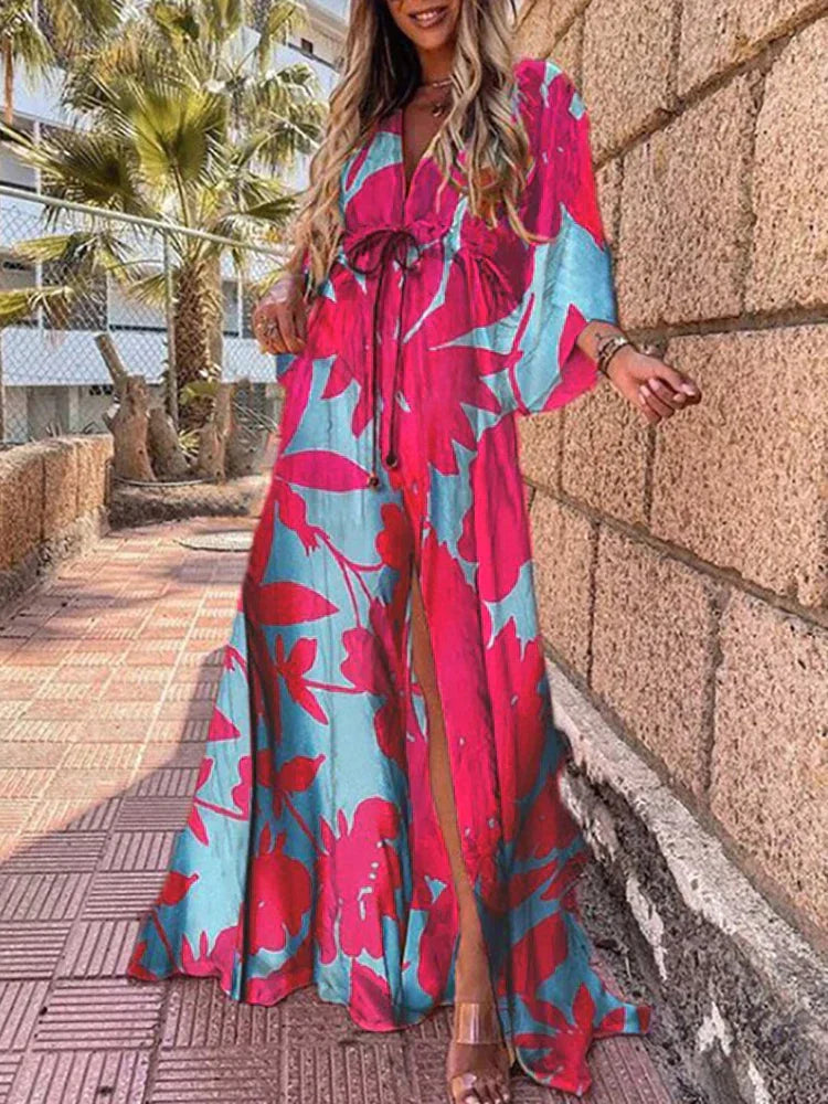Chic women's V-neck maxi dress featuring dramatic kimono sleeves and a flattering high slit.