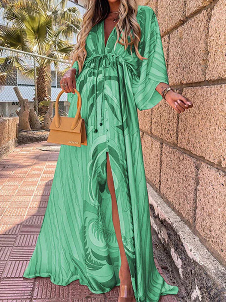 Fashionable V-neck maxi dress for women, featuring elegant kimono sleeves and a stylish high slit.