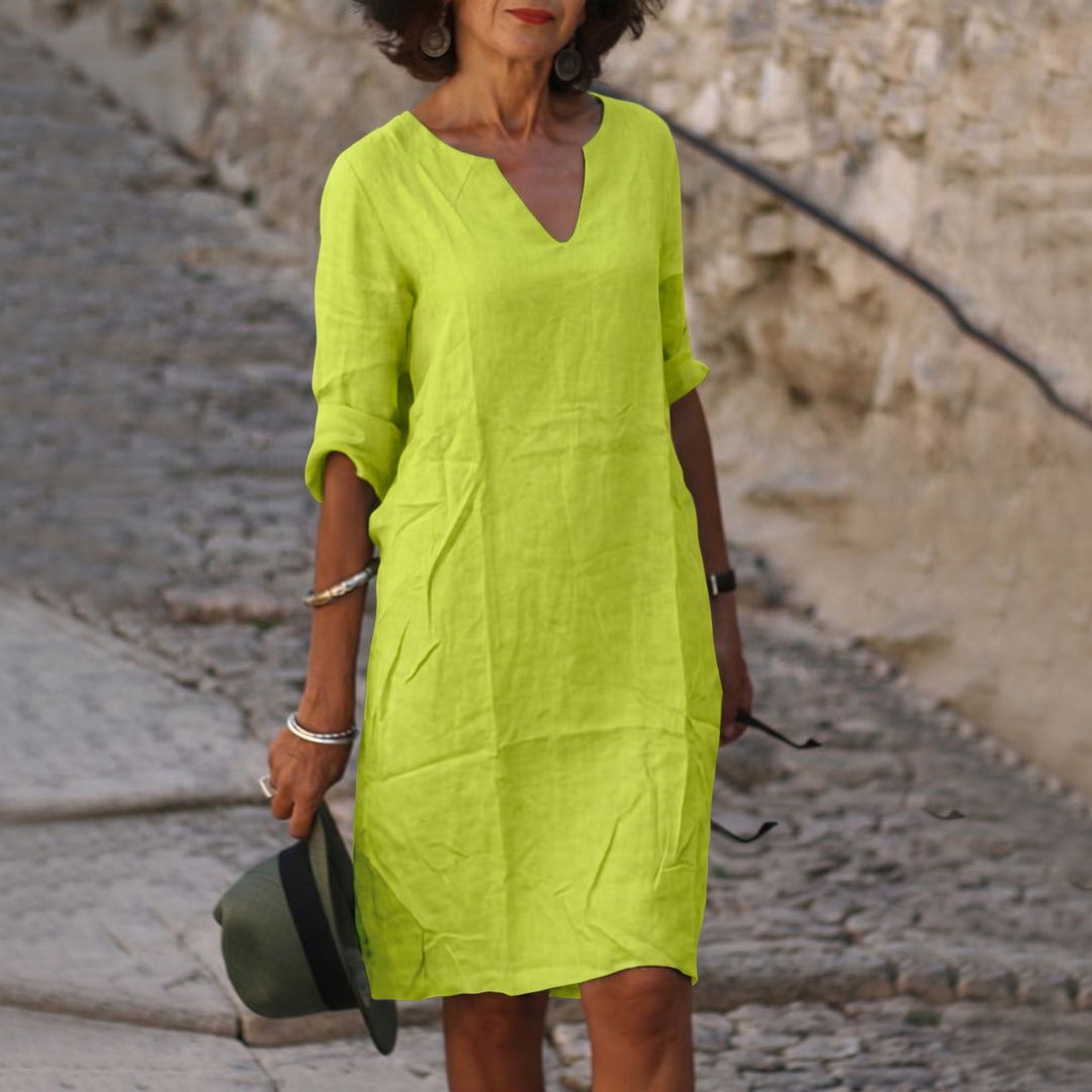 Comfortable relaxed fit V-neck midi dress for women, perfect for spring and summer.